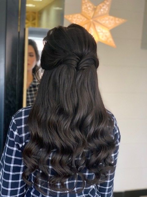 Half-up curled style on dark brunette hair